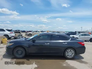2016 Nissan Altima S z VIN 1N4AL3APXGN348769, wystawiony jako IAAI lot #42199355 z przebiegiem 135 584 mil mil oraz . Historia ofert i sprzedaży dostępna na DreamBid. Obrazek 14.