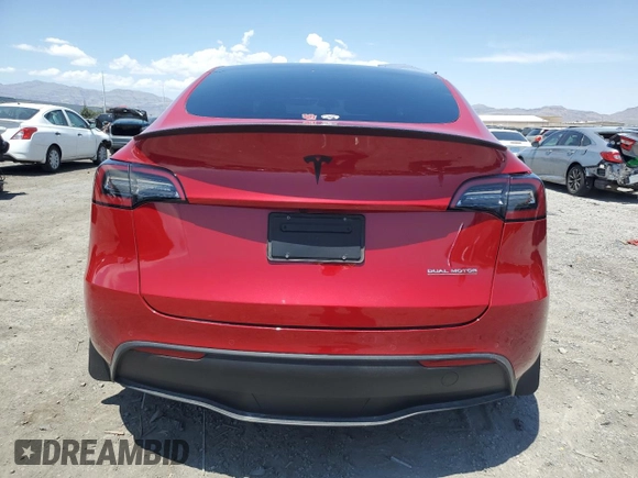 2022 Tesla Model Y Performance z VIN 7SAYGDEF9NF510183, wystawiony jako Copart lot #61263405 z przebiegiem 19 411 mil mil oraz Szkoda całkowita • Salvage title. Historia ofert i sprzedaży dostępna na DreamBid. Obrazek 6.