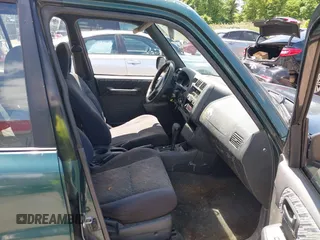 1998 Toyota RAV4 with VIN JT3GP10V6W0023680, listed as a IAAI auction lot 42235877 with 244,446 mi miles and . Bid and sale history available at DreamBid. Image 5.