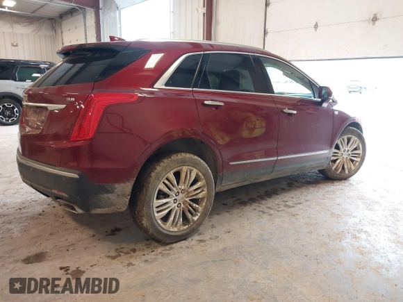 2018 Cadillac XT5 Premium Luxury AWD z VIN 1GYKNFRS6JZ114464, wystawiony jako IAAI lot #42320302 z przebiegiem 61 231 mil mil oraz . Historia ofert i sprzedaży dostępna na DreamBid. Obrazek 4.