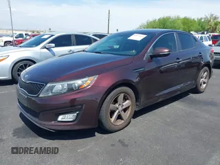 2014 Kia Optima LX with VIN 5XXGM4A77EG303496, listed as a IAAI auction lot 42572421 with 117,151 mi miles and . Bid and sale history available at DreamBid. Image 6.