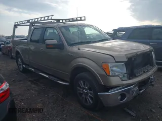 2011 Ford F-150 XL with VIN 1FTFW1EF1BFA05171, listed as a IAAI auction lot 41524808 with 216,946 mi miles. Bid and sale history available at carsss.com. Image 1.