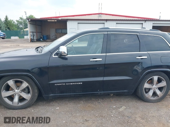 2015 Jeep Grand Cherokee High Altitude with VIN 1C4RJFCGXFC604663, listed as a IAAI auction lot 42816306 with 117,467 mi miles and . Bid and sale history available at DreamBid. Image 14.