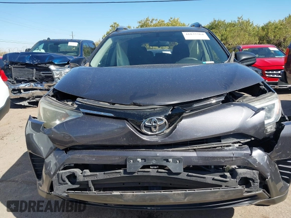 2016 Toyota RAV4 LE with VIN JTMBFREV4GJ052168, listed as a IAAI auction lot 41837564 with 73,659 mi miles. Bid and sale history available at carsss.com. Image 12.