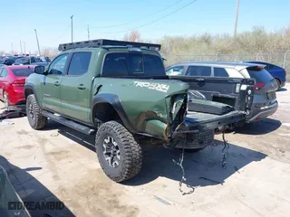 2021 Toyota Tacoma 4WD SR with VIN 3TMCZ5ANXMM382874, listed as a IAAI auction lot 41965388 with 62,178 mi miles. Bid and sale history available at carsss.com. Image 3.