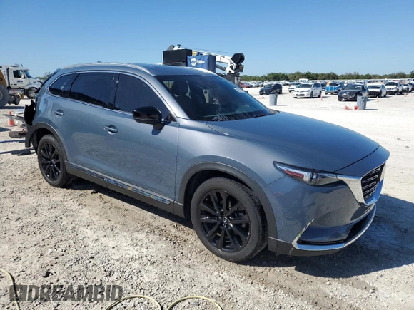 2023 Mazda CX-9 Carbon Edition with VIN JM3TCBDY8P0653953, listed as a Copart auction lot 48810905 with 27,677 mi miles and Salvage title. Bid and sale history available at DreamBid. Image 4.