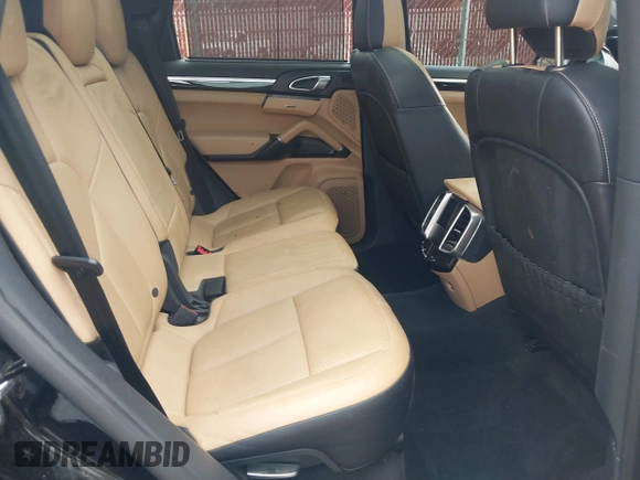 2014 Porsche Cayenne with VIN WP1AA2A26ELA97738, listed as a IAAI auction lot 42445351 with 118,381 mi miles and . Bid and sale history available at DreamBid. Image 8.