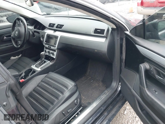2013 Volkswagen CC Sport with VIN WVWBP7AN2DE506977, listed as a IAAI auction lot 41440929 with 62,385 mi miles. Bid and sale history available at carsss.com. Image 5.