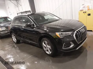 2020 Audi Q3 Premium with VIN WA1AECF33L1035892, listed as a IAAI auction lot 41497817 with 76,637 mi miles. Bid and sale history available at carsss.com. Image 1.