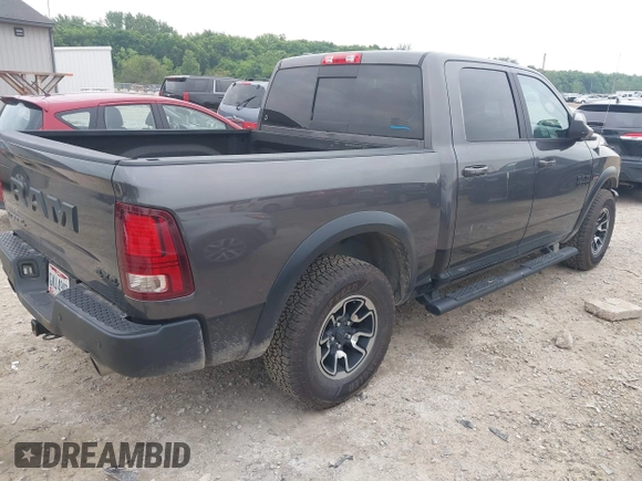 2017 Ram 1500 Rebel with VIN 1C6RR7YT5HS610293, listed as a IAAI auction lot 42454064 with 103,515 mi miles and . Bid and sale history available at DreamBid. Image 4.