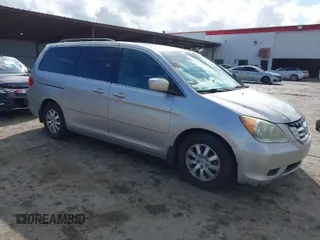 2009 Honda Odyssey EX-L with VIN 5FNRL38649B003376, listed as a IAAI auction lot 41903760 with 195,282 mi miles. Bid and sale history available at carsss.com. Image 1.