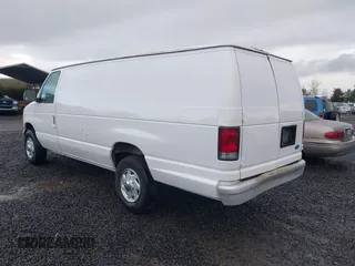 1996 Ford Econoline Cargo with VIN 1FTJS34H4THA69893, listed as a IAAI auction lot 41703257 with 206,503 mi miles and . Bid and sale history available at DreamBid. Image 3.