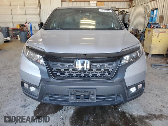 2021 Honda Passport EX-L with VIN 5FNYF7H54MB008281, listed as a Copart auction lot 50746845 with 77,559 mi miles and Salvage Title. Bid and sale history available at DreamBid. Image 5.