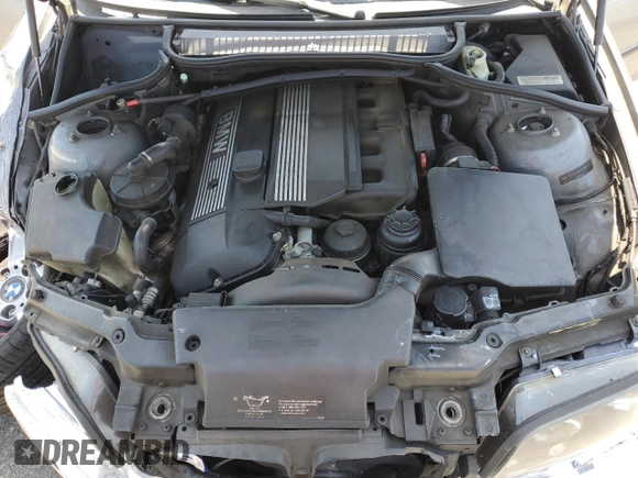 2005 BMW 3 Series 330i with VIN WBAEV53485KM39295, listed as a Copart auction lot 61581235 with 185,054 mi miles and Salvage title. Bid and sale history available at DreamBid. Image 11.