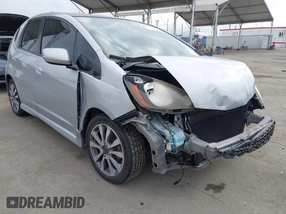 2013 Honda Fit Sport with VIN JHMGE8H58DC003021, listed as a IAAI auction lot 42120318 with 233,056 mi miles. Bid and sale history available at carsss.com. Image 1.