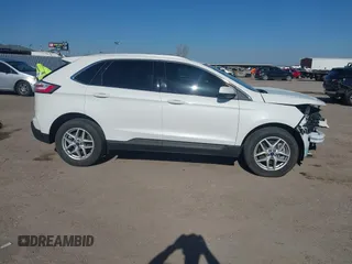 2022 Ford Edge SEL z VIN 2FMPK4J90NBA02961, wystawiony jako IAAI lot #41446422 z przebiegiem 29 313 mil mil oraz . Historia ofert i sprzedaży dostępna na DreamBid. Obrazek 14.