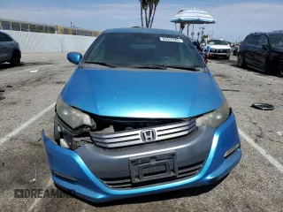 2010 Honda Insight LX with VIN JHMZE2H51AS028849, listed as a Copart auction lot 65547805 with 209,316 mi miles and Salvage title. Bid and sale history available at DreamBid. Image 5.