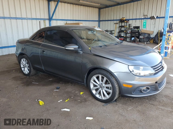 2014 Volkswagen Eos Komfort with VIN WVWBW8AH9EV006190, listed as a Copart auction lot 52390705 with 124,370 mi miles and Salvage Title. Bid and sale history available at DreamBid. Image 4.