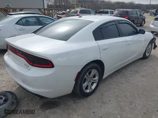 2015 Dodge Charger SE with VIN 2C3CDXBGXFH812015, listed as a IAAI auction lot 41869666 with 108,823 mi miles. Bid and sale history available at carsss.com. Image 4.