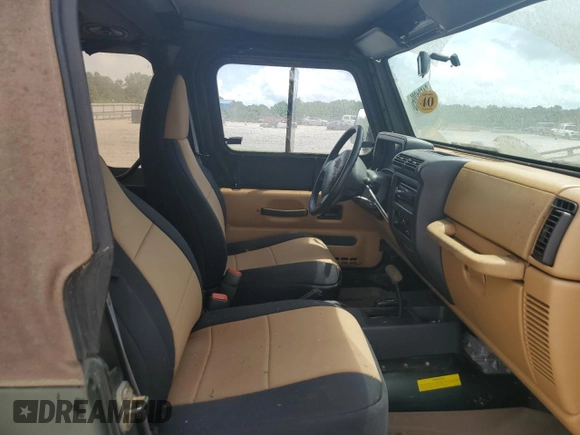 1998 Jeep Wrangler SE with VIN 1J4FY29P8WP784825, listed as a Copart auction lot 61581205 with 148,152 mi miles and Clean title. Bid and sale history available at DreamBid. Image 10.