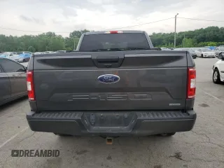 2019 Ford F-150 XL with VIN 1FTEX1EP9KKC47098, listed as a Copart auction lot 60653275 with 104,823 mi miles and Salvage title. Bid and sale history available at DreamBid. Image 6.