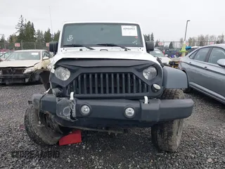 2017 Jeep Wrangler Unlimited Sport with VIN 1C4BJWDG2HL520081, listed as a IAAI auction lot 41916923 with 73,592 mi miles. Bid and sale history available at carsss.com. Image 12.