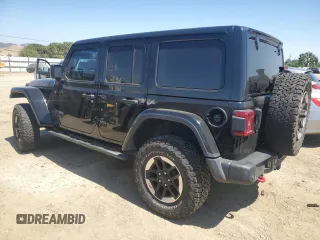 2020 Jeep Wrangler Unlimited Rubicon с VIN 1C4HJXFN3LW350249, выставлен на аукционе Copart как лот 60696895 с пробегом 56 577 миль миль и Списание • Salvage title. История ставок и продаж доступна на DreamBid. Изображение 2.