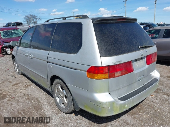 2001 Honda Odyssey EX z VIN 2HKRL18661H597205, wystawiony jako IAAI lot #41838509 z przebiegiem 317 084 mil mil oraz . Historia ofert i sprzedaży dostępna na DreamBid. Obrazek 3.