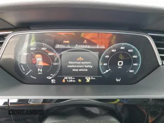 2021 Audi e-tron Premium Plus with VIN WA1LAAGE4MB003487, listed as a Copart auction lot 82790024 with 28,165 mi miles and Salvage title. Bid and sale history available at DreamBid. Image 9.