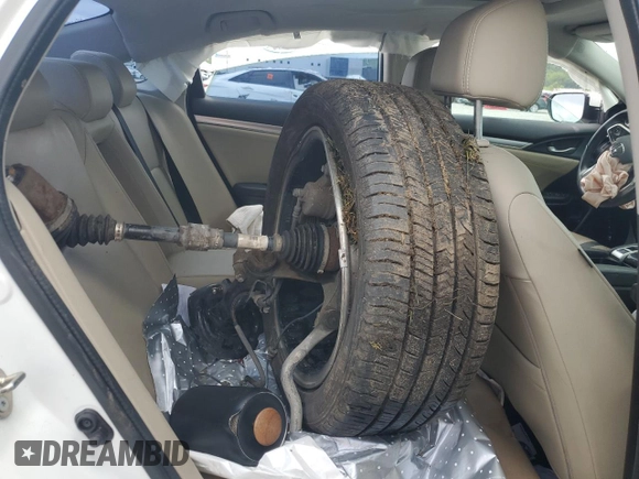 2016 Honda Civic EX-L с VIN 2HGFC1F74GH650713, выставлен на аукционе Copart как лот 58959515 с пробегом Не указан миль и Списание • Salvage title. История ставок и продаж доступна на DreamBid. Изображение 10.