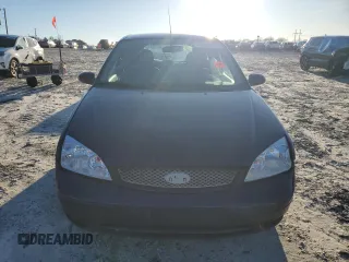 2007 Ford Focus S with VIN 1FAFP31N57W117622, listed as a Copart auction lot 45562335 with 232,209 mi miles and Salvage Title. Bid and sale history available at DreamBid. Image 5.