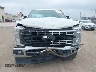 2024 Ford Super Duty F-250 SRW XL with VIN 1FT7W2BT2RED24809, listed as a IAAI auction lot 42186884 with 82,971 mi miles. Bid and sale history available at carsss.com. Image 12.