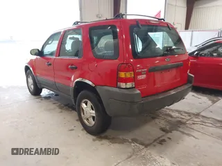 2001 Ford Escape XLS with VIN 1FMYU02191KE79727, listed as a IAAI auction lot 41720383 with 223,554 mi miles. Bid and sale history available at carsss.com. Image 3.