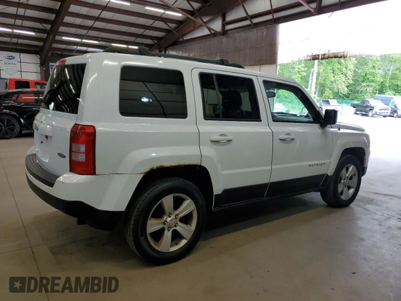 2014 Jeep Patriot Latitude with VIN 1C4NJRFB3ED766143, listed as a Copart auction lot 57879215 with 145,733 mi miles and Clean title. Bid and sale history available at DreamBid. Image 3.