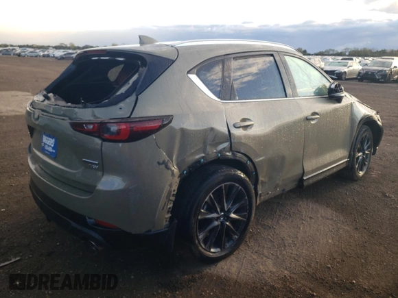 2024 Mazda CX-5 2.5 Carbon Turbo with VIN JM3KFBAY7R0358093, listed as a Copart auction lot 75492214 with 14,624 mi miles and Salvage Title. Bid and sale history available at carsss.com. Image 3.
