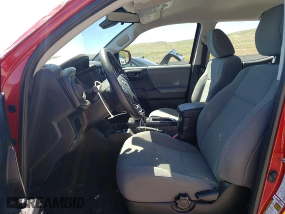 2018 Toyota Tacoma SR with VIN 5TFAX5GN6JX123910, listed as a Copart auction lot 55942755 with 76,043 mi miles and Salvage title. Bid and sale history available at DreamBid. Image 7.