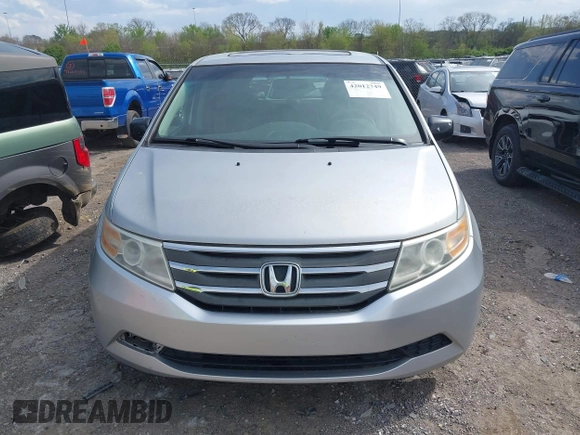 2012 Honda Odyssey EX-L with VIN 5FNRL5H68CB131431, listed as a IAAI auction lot 42012749 with 245,649 mi miles and . Bid and sale history available at carsss.com. Image 12.