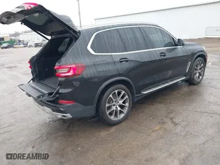 2023 BMW X5 xDrive40i with VIN 5UXCR6C03P9P62891, listed as a IAAI auction lot 41492392 with 51,471 mi miles. Bid and sale history available at carsss.com. Image 4.