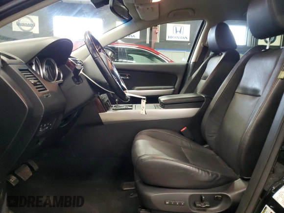 2015 Mazda CX-9 Grand Touring z VIN JM3TB3DVXF0463049, wystawiony jako Copart lot #44909745 z przebiegiem 146 534 mil mil oraz Czysty tytuł • Clean title. Historia ofert i sprzedaży dostępna na DreamBid. Obrazek 7.