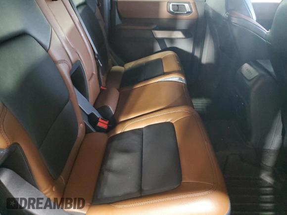 2023 Ford Bronco z VIN 1FMDE5BH3PLB47307, wystawiony jako Copart lot #56156495 z przebiegiem 16 178 mil mil oraz Szkody całkowita. Historia ofert i sprzedaży dostępna na DreamBid. Obrazek 11.
