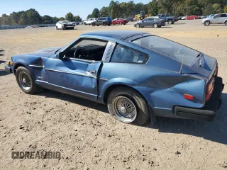 1979 Datsun 280ZX z VIN HS130133365, wystawiony jako Copart lot #77113584 z przebiegiem 99 721 mil mil oraz Szkody całkowita. Historia ofert i sprzedaży dostępna na DreamBid. Obrazek 2.