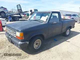 1992 Ford Ranger XLT z VIN 1FTCR10X3NUA73868, wystawiony jako IAAI lot #41836220 z przebiegiem 97 165 mil mil oraz . Historia ofert i sprzedaży dostępna na DreamBid. Obrazek 17.