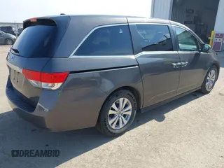 2014 Honda Odyssey EX-L z VIN 5FNRL5H64EB031426, wystawiony jako IAAI lot #41777542 z przebiegiem 162 426 mil mil oraz . Historia ofert i sprzedaży dostępna na DreamBid. Obrazek 4.