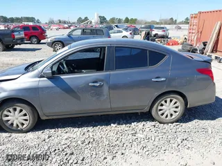 2019 Nissan Versa Sedan SV with VIN 3N1CN7AP0KL831378, listed as a IAAI auction lot 41694099 with 148,841 mi miles. Bid and sale history available at carsss.com. Image 14.