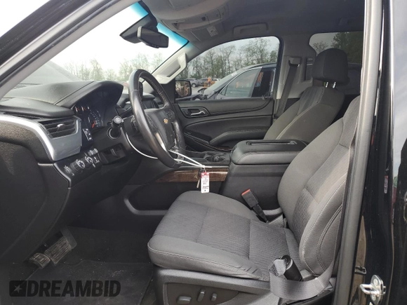 2018 Chevrolet Tahoe LS z VIN 1GNSKAKC8JR215839, wystawiony jako Copart lot #52627955 z przebiegiem 96 380 mil mil oraz Szkoda całkowita • Salvage title. Historia ofert i sprzedaży dostępna na DreamBid. Obrazek 7.