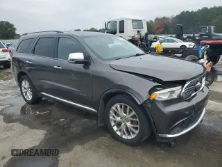 2014 Dodge Durango Citadel with VIN 1C4RDHEG5EC317830, listed as a Copart auction lot 83944054 with 213,837 mi miles and Salvage title. Bid and sale history available at DreamBid. Image 4.