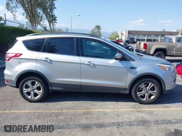 2015 Ford Escape SE with VIN 1FMCU0GX6FUA40651, listed as a IAAI auction lot 42117925 with 121,469 mi miles and . Bid and sale history available at DreamBid. Image 12.