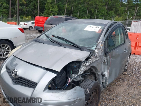 2010 Toyota Yaris with VIN JTDKT4K37A5281975, listed as a IAAI auction lot 39843782 with 257,802 mi miles. Bid and sale history available at carsss.com. Image 6.