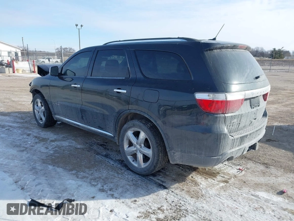 2013 Dodge Durango Citadel with VIN 1C4SDJET1DC505202, listed as a IAAI auction lot 41613403 with 148,424 mi miles and . Bid and sale history available at carsss.com. Image 3.