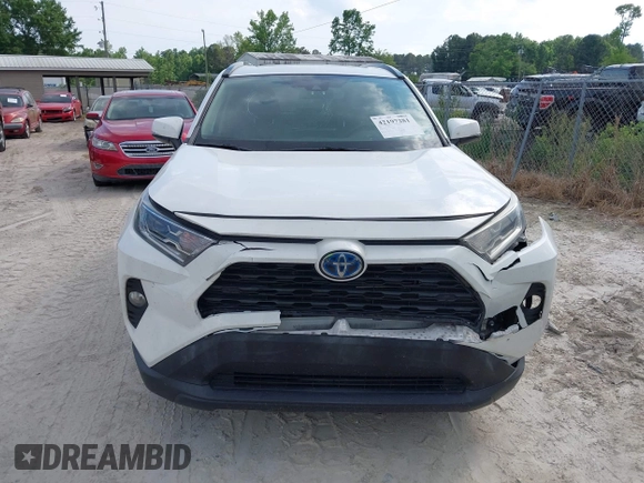 2020 Toyota RAV4 Hybrid XLE z VIN 2T3RWRFV7LW072553, wystawiony jako IAAI lot #42197281 z przebiegiem 166 115 mil mil oraz . Historia ofert i sprzedaży dostępna na DreamBid. Obrazek 12.